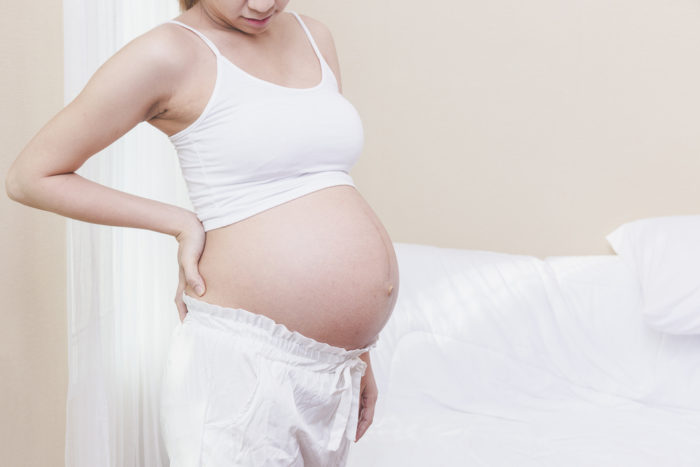 dolor de espalda durante el embarazo usando almohadilla térmica
